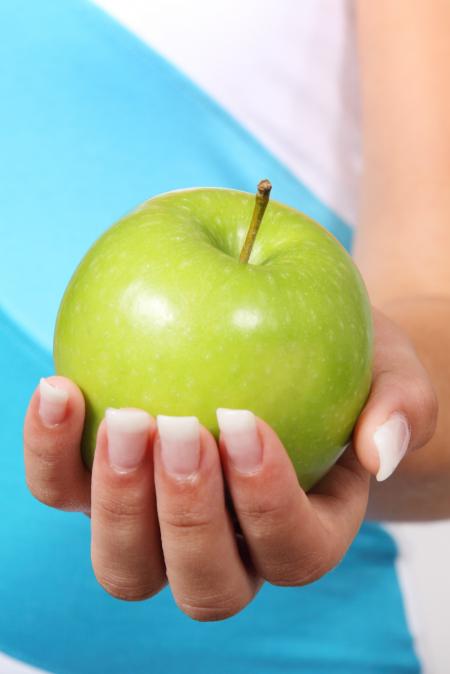 Holding an Apple