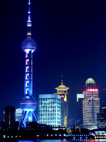 Illuminated City Skyline at Night