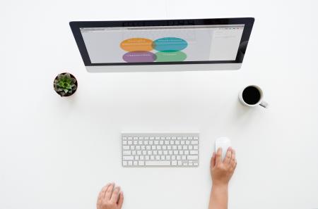 Imac On White Surface Near Apple Keyboard And Magic Mouse