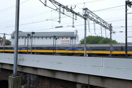 International train leaving Amsterdam CS