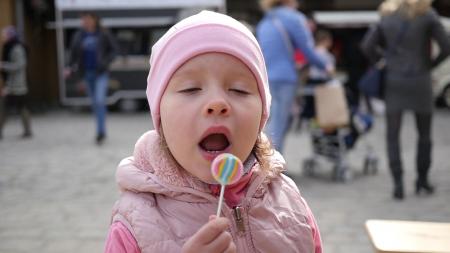 Kids licking Candy