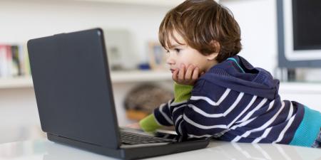 Kids using Laptops