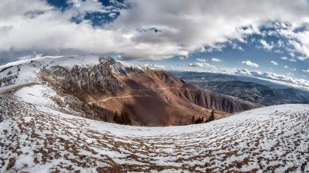 Landscape Photo of Snowy Mountain Under Cloudy Sky