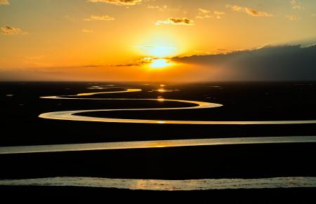 Large Body of Water Stream during Dawn