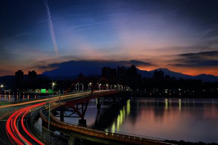 Light Rays on Bridge during Nighttime