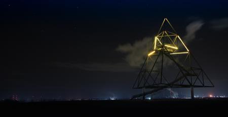 Light Trails in City Against Sky at Night