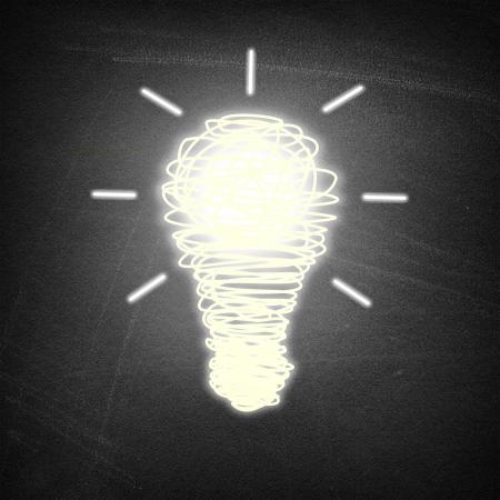 Lightbulb idea on chalkboard background