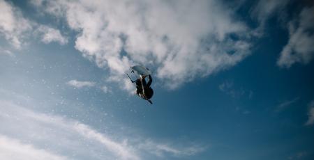 Low Angle Photo of Wakeboarder in the Sky