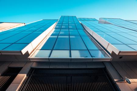 Low Angle Photography of Blue Glass Building