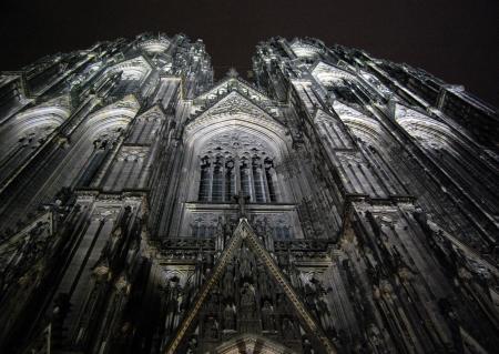 Low Angle Photography of Gray Concrete Cathedral at Nighttime