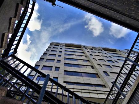 Low-angle Photography of High Rise Building Under Stratus Clouds