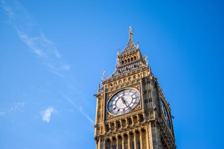 Low Angle View of Clock Tower Against Blue Sky