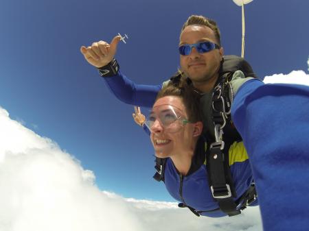 Man and Woman in Blue Jacket Doing Sky Diving