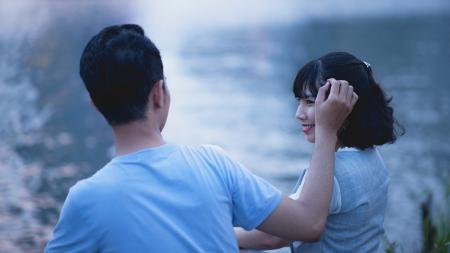 Man and Woman Wearing Shirt Shallow Focus Photography