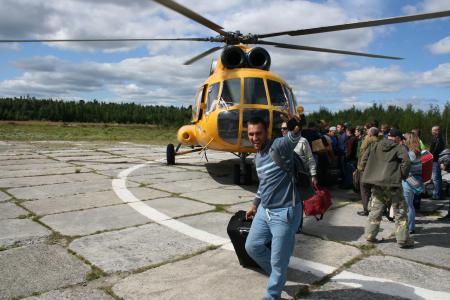 man arriving on helicopter