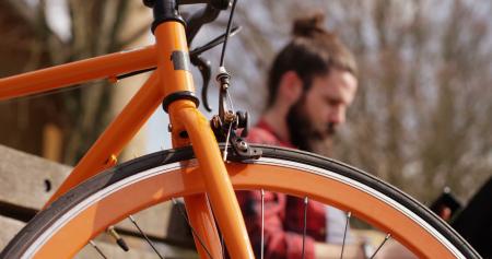 Man Beside Bicycle