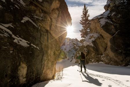 Man Hiking in Snowy Mountain