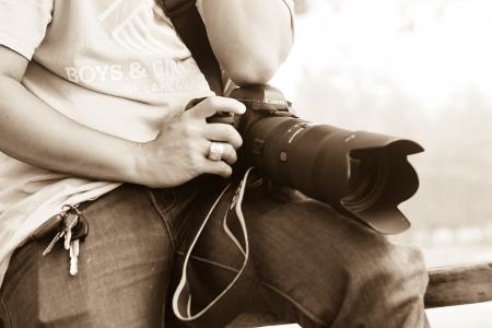 Man Holding Dslr Camera