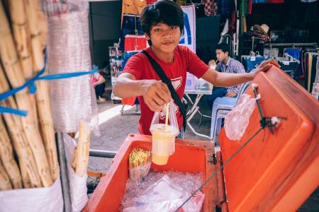 Man Holding Plastic Cup