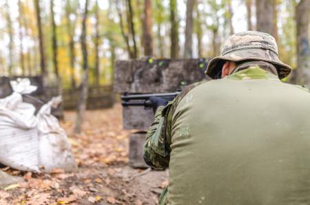 Man Holding Rifle