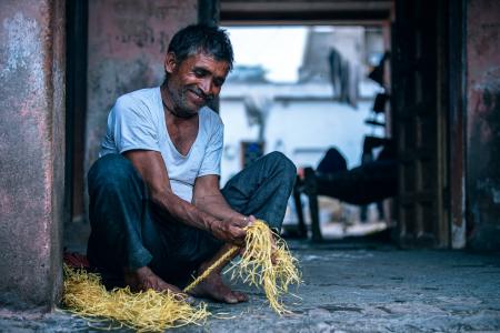 Man Holding Yellow String