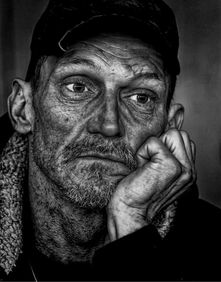 Man in Black Cap Grayscale Photo