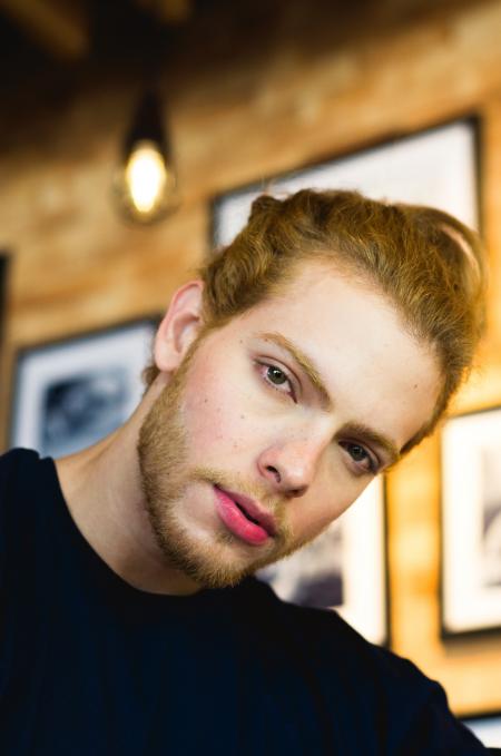 Man in Black Crew-neck Top With Pink Lips