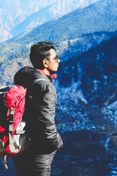 Man in Black Jacket Taking Selfie on Top of Mountain
