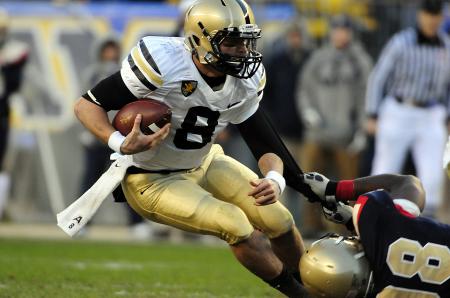 Man in Black Jersey Holding Jersey Number 8 With Ball