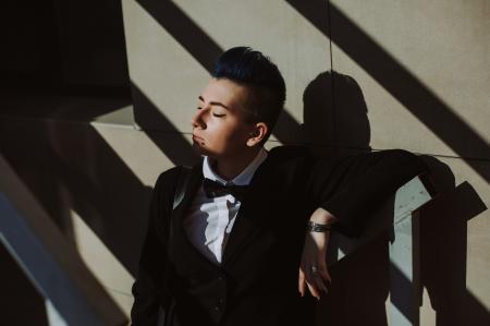 Man in Black Suit Jacket on Stairs