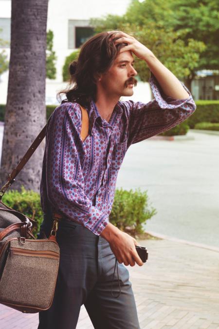 Man in Blue Button-up Long-sleeve Shirt