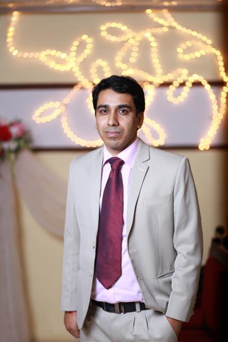 Man in Grey and Pink Suit