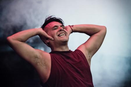 Man in Maroon Tank Top