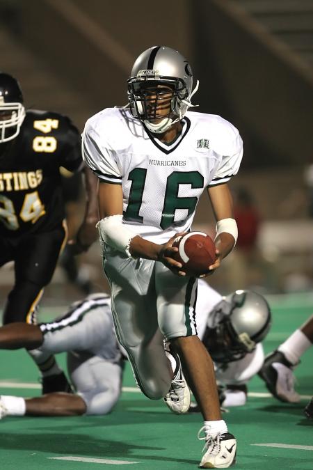 Man in White 16 Football Jersey While Playing Football