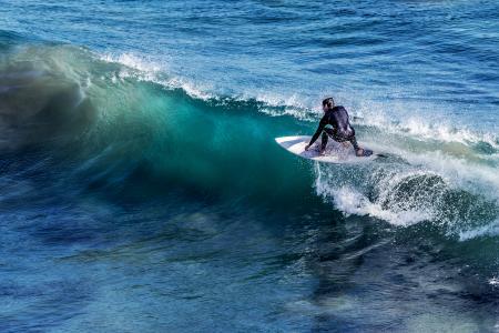 Man in White Surfboard