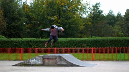 Man Jumping on Rollerskates Ramp