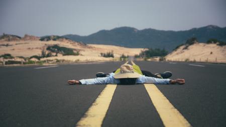 Man on Mountain Against Sky