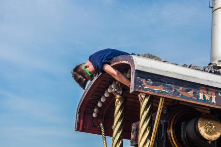 Man on Roof during Daytime
