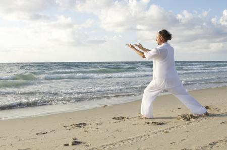 Man Posing on Sea Shore during Daytime