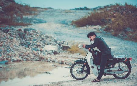 Man Riding a Motorcycle