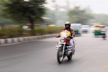 Man Riding on Motorcycle