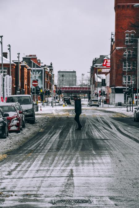 Man Standing in the Middle of the Road