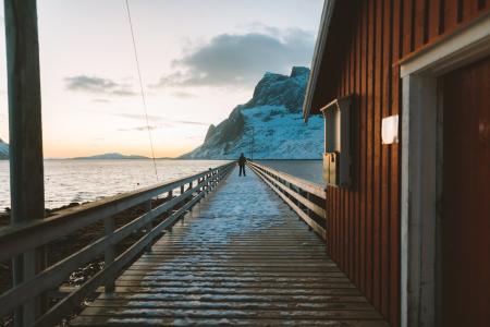 Man Standing On Pier