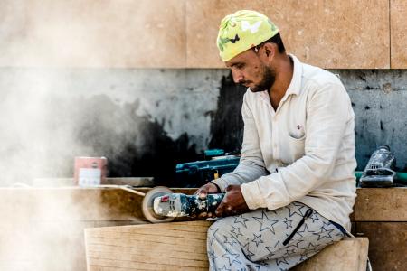 Man Using Angle Grinder