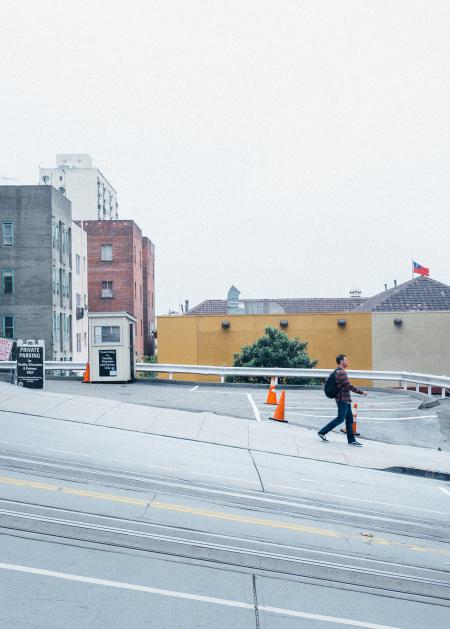 Man Walking on the Street