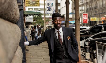 Man Wearing Black Shawl Lapel Suit Jacket