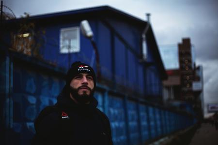 Man Wearing Black Shirt and Knit Cap