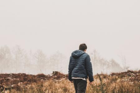 Man Wearing Blue Bubble Jacket