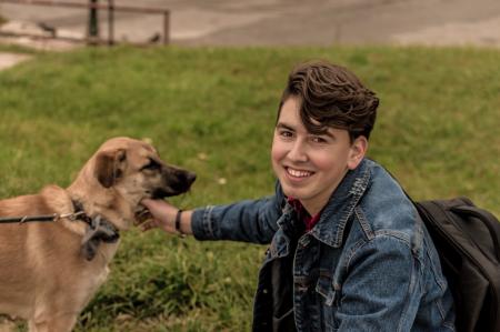 Man Wearing Blue Denim Jacket