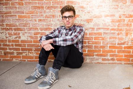 Man Wearing Clear Eyeglasses With Black Fram